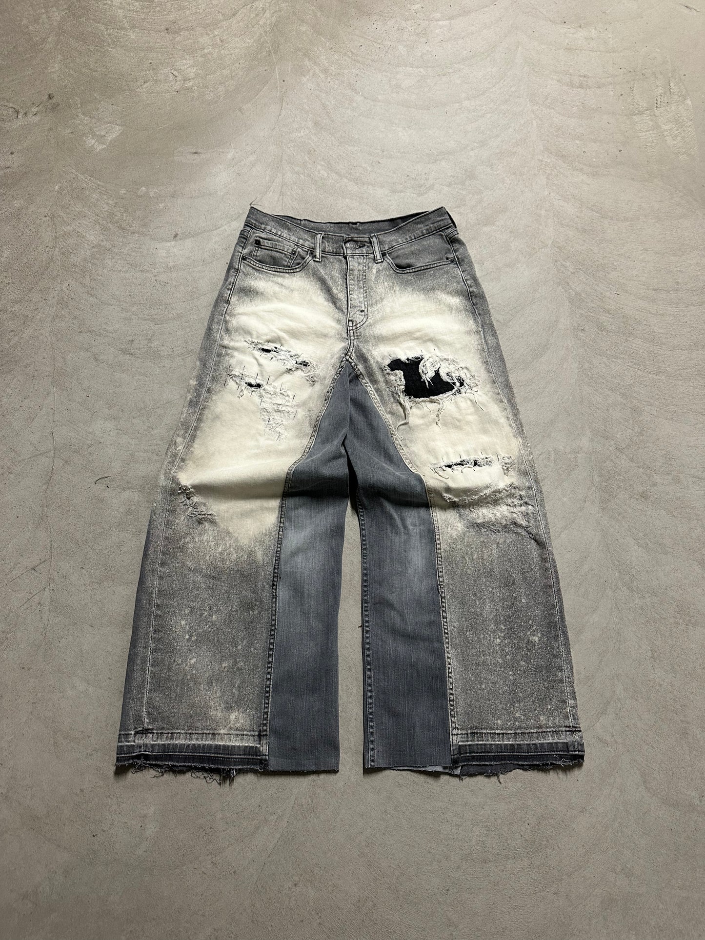 Grey baggy distressed jeans