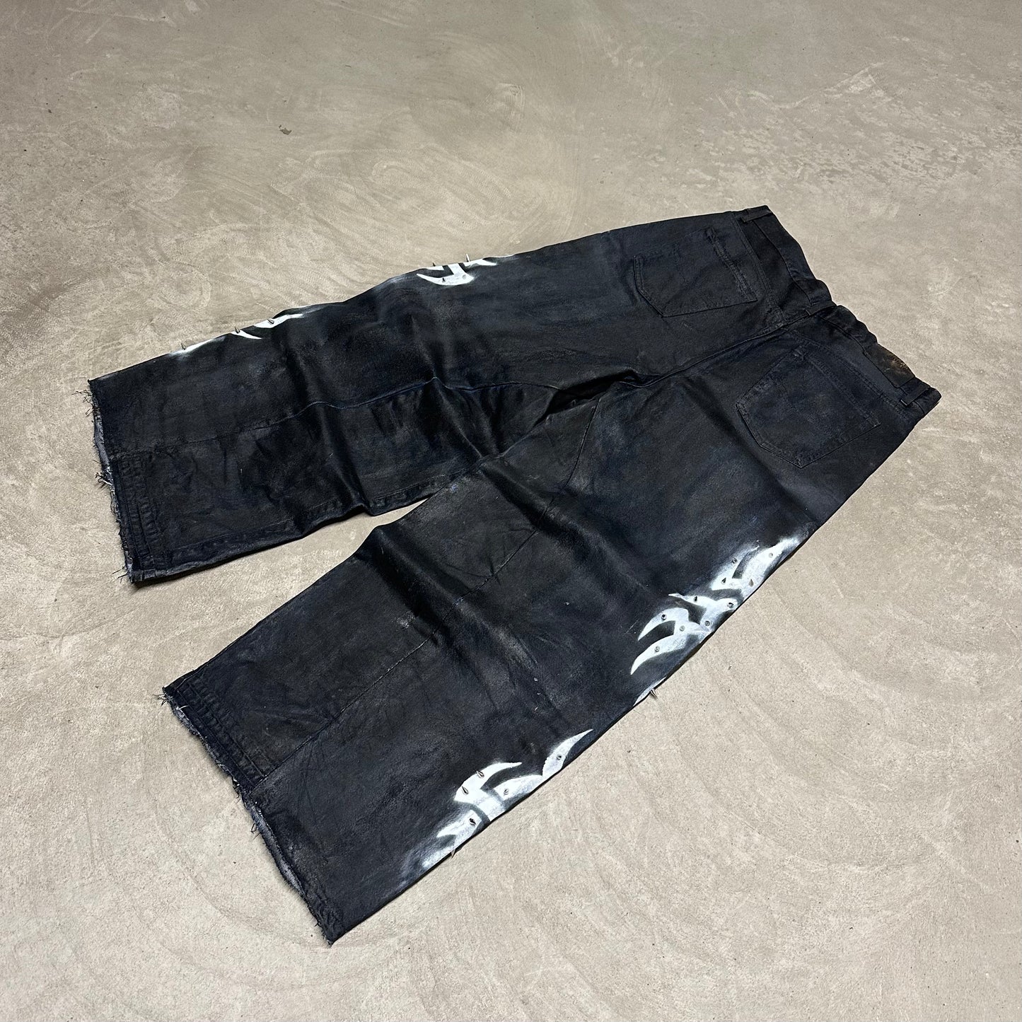 Tribal hand painted black baggy jeans