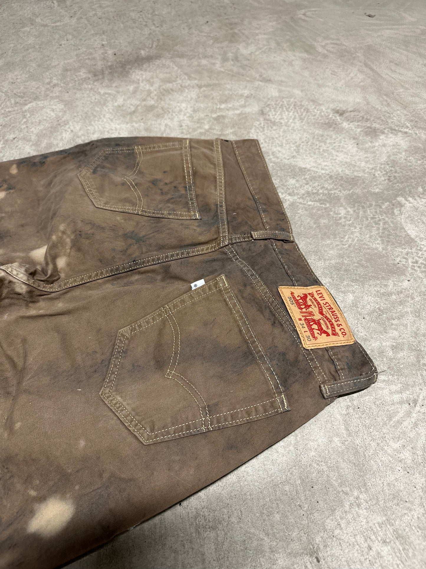 Brown distressed baggy jeans